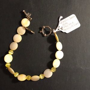 Handcrafted yellow awareness bracelet